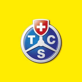 Logo TTC S, transport adapté pour personnes à mobilité réduite, avec un symbole de roue et un croix.